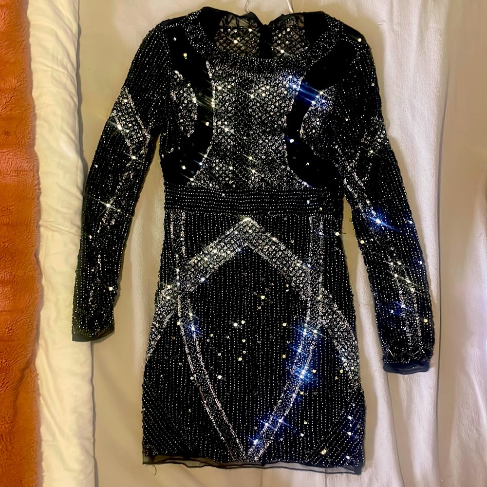 Cute party dress. Nice quality. Bought at Dillard’s.